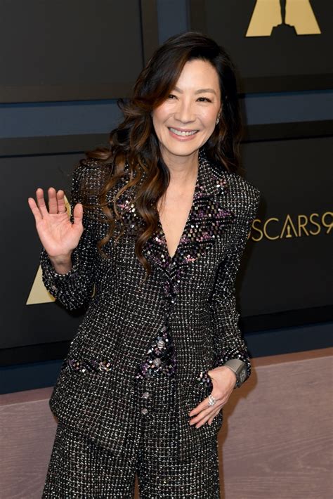 Michelle Yeoh Sparkles in Chanel Suit at Oscars Nominees 